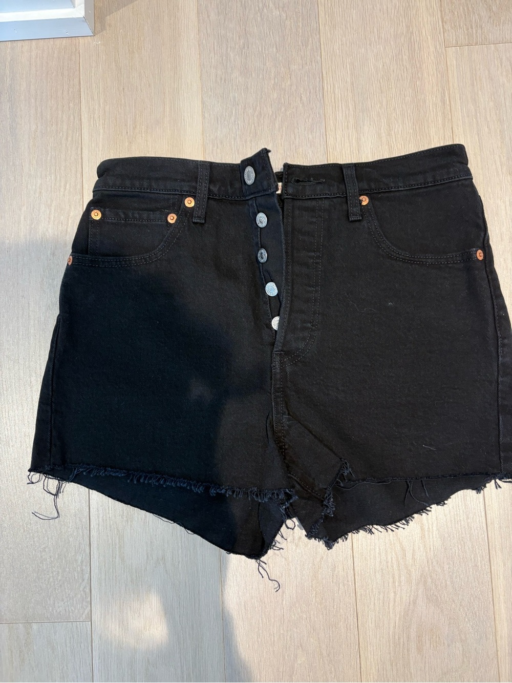 High-Rise Black Button-Fly Denim Shorts with Raw Hem